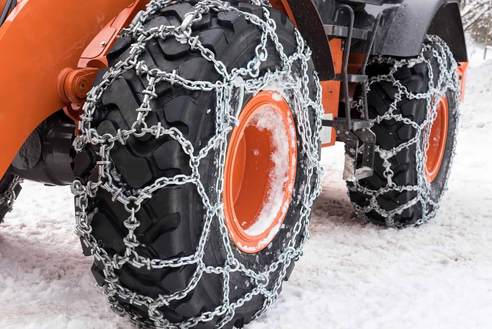 Bulldozer tires with snow chains Snow Removal Company